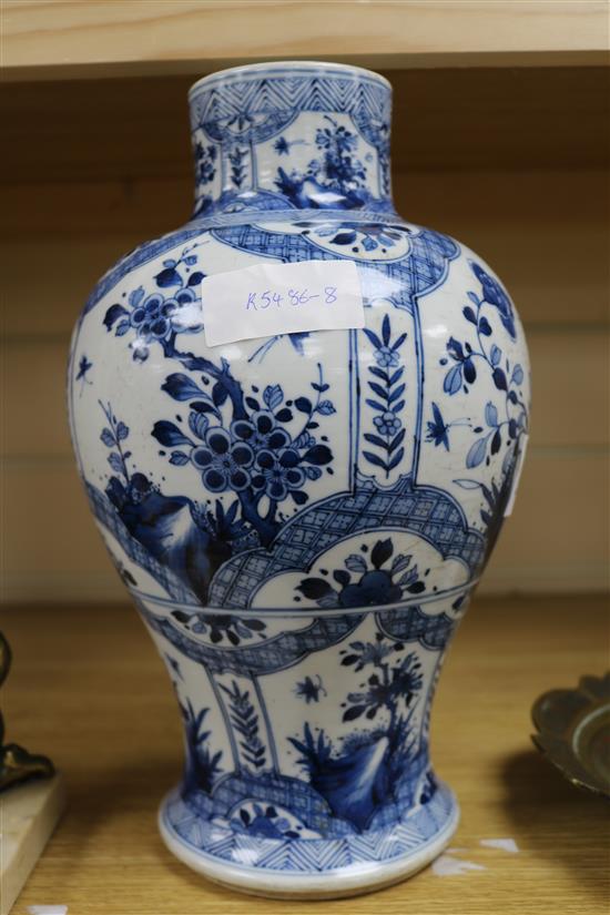 A Chinese blue and white baluster vase 30cm.